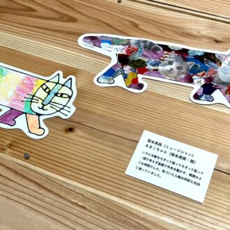 会場には著名人の塗り絵も。坂本美雨さんはちぎった紙を貼りつけて